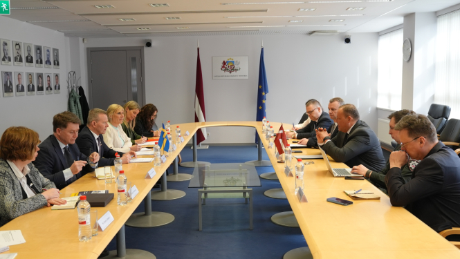 R.Kozlovska tikšanās ar M.Friselu